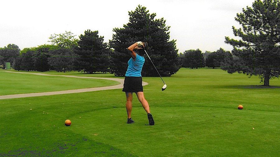  Our Net Division Champion Susan Iannacchione takes a nice swing and finsish here